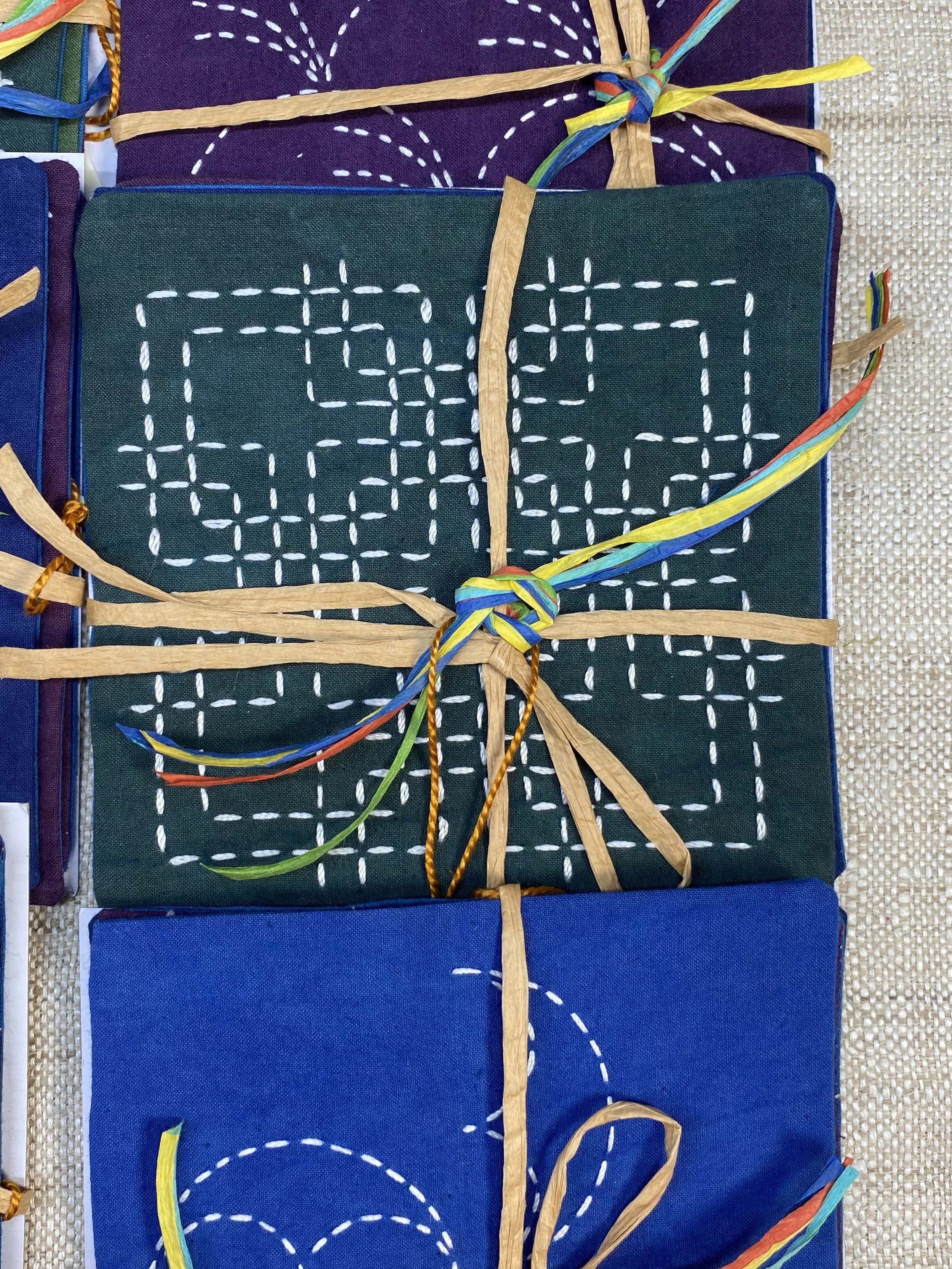 close up of moyouzashi sashiko stitching on a coaster set