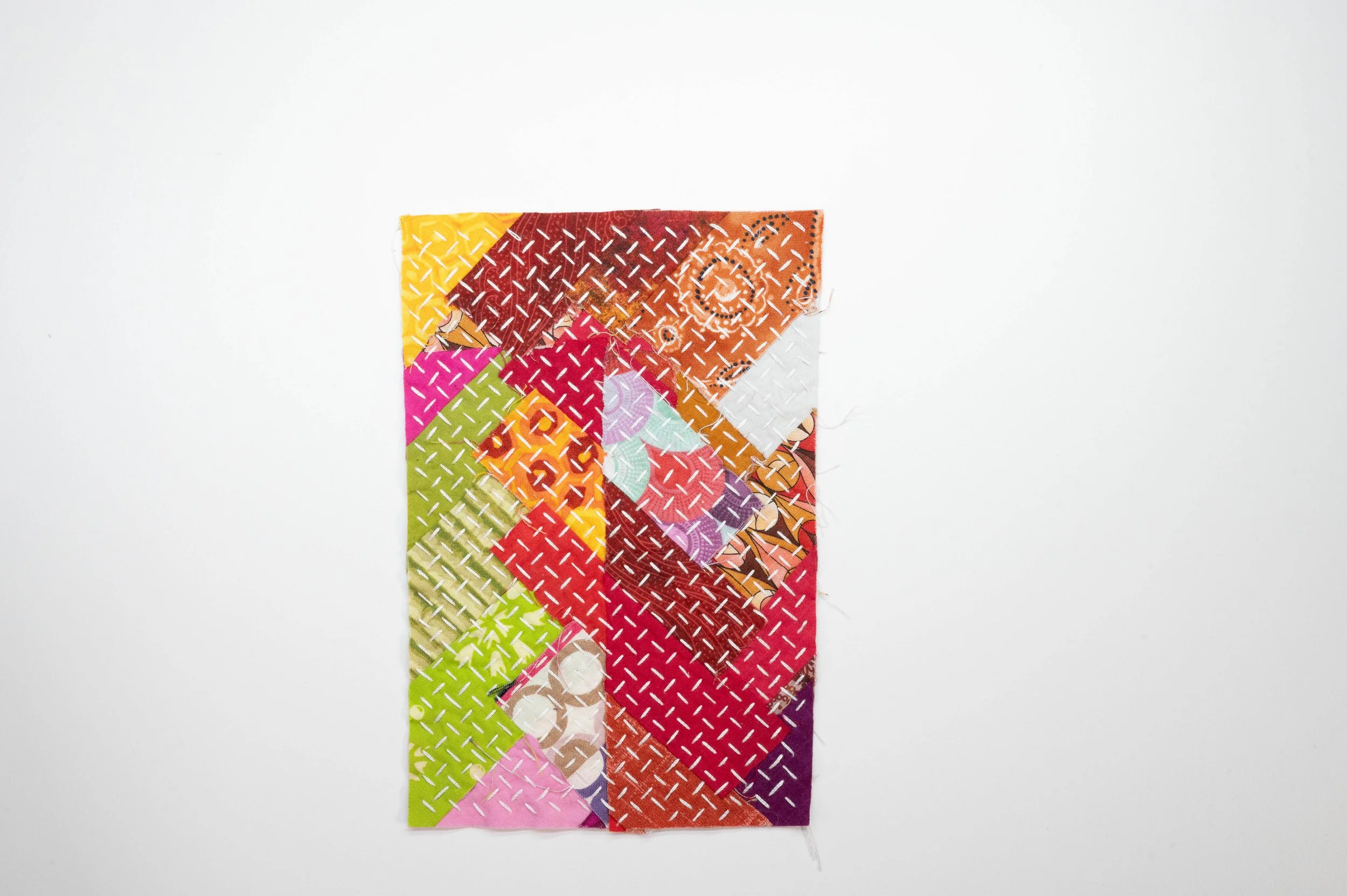 Reclaimed no. 6 • 2025
• Improv pieced reclaimed and hand-dyed fabric, hitomezasii sashiko
• 4 x 5 in.
• Available