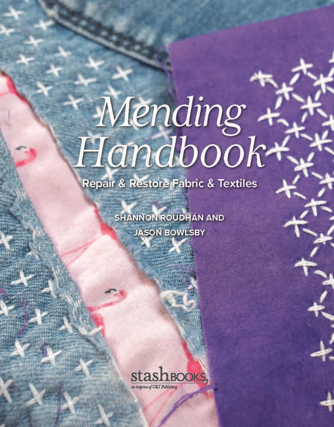 mending handbook inside cover with sashiko stitching and pink flamingo fabric