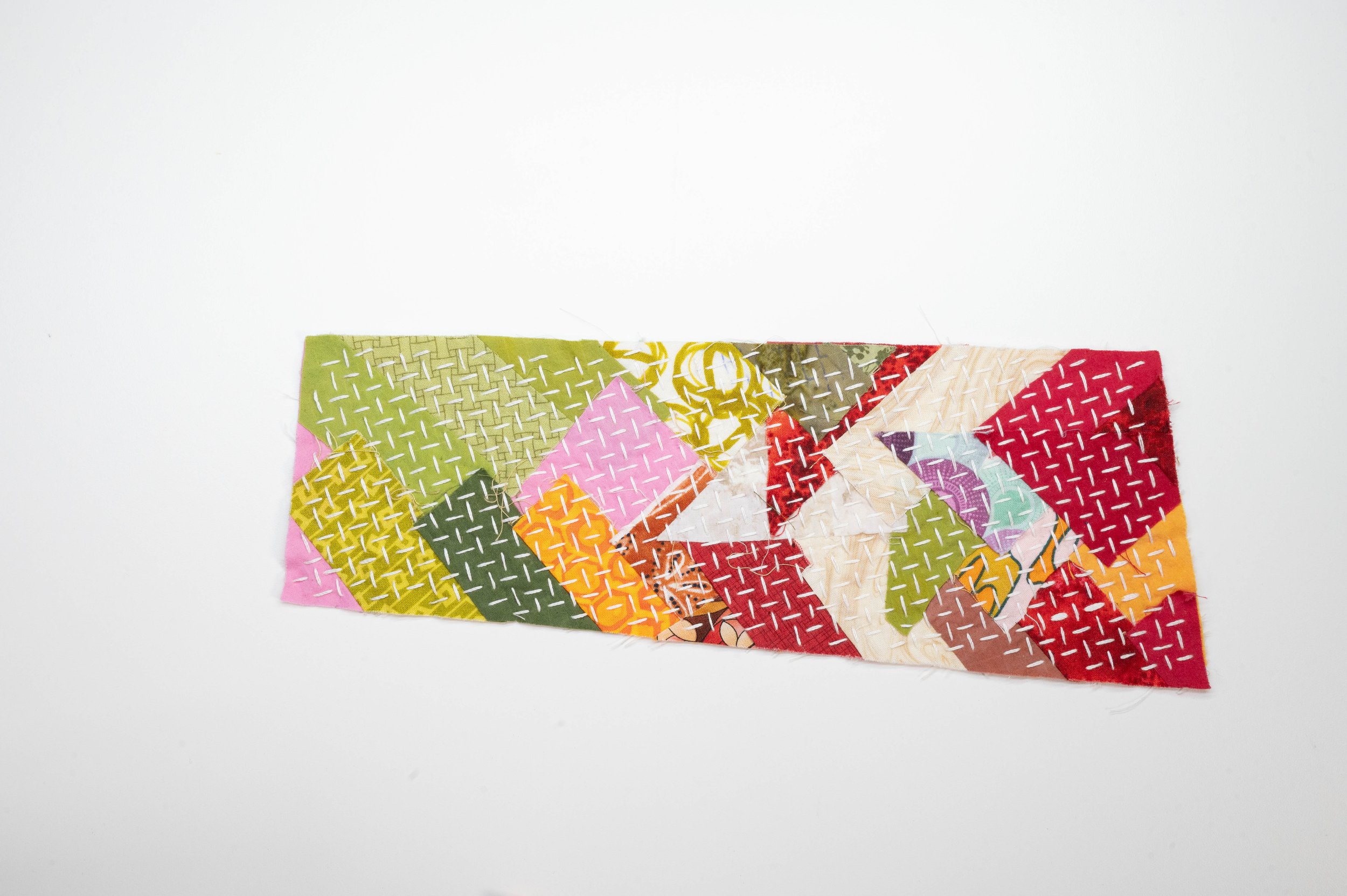 Reclaimed no. 5 • 2025
• Improv pieced reclaimed and hand-dyed fabric, hitomezasii sashiko
• 4 x 13 in.
• Available