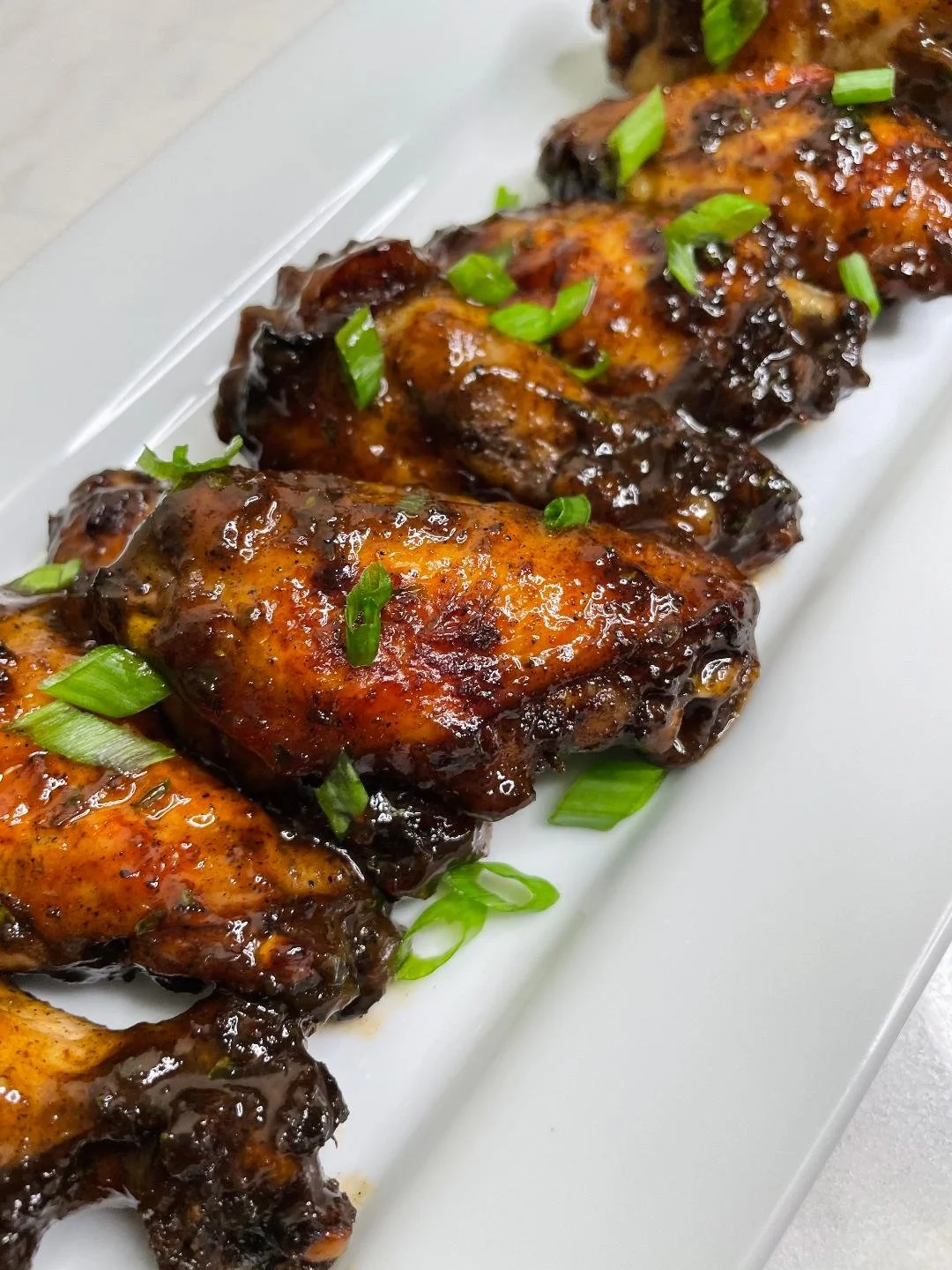 Wings Jerk, Lemon Pepper, or Honey BBQ wings served with pickled vegetables and ranch.