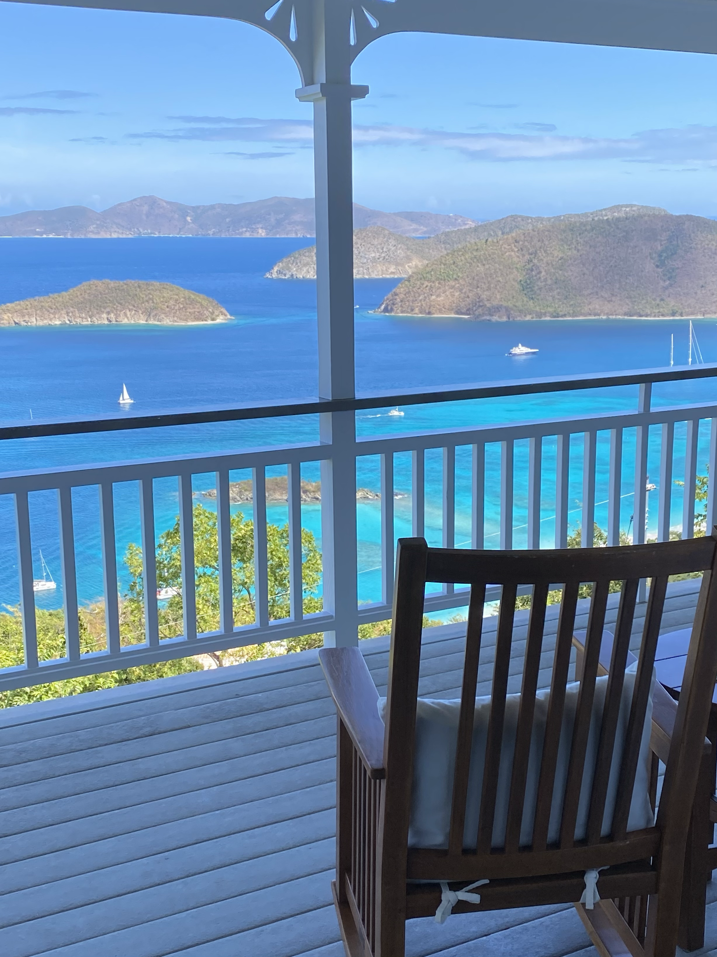 Rocking chairs on main level covered deck