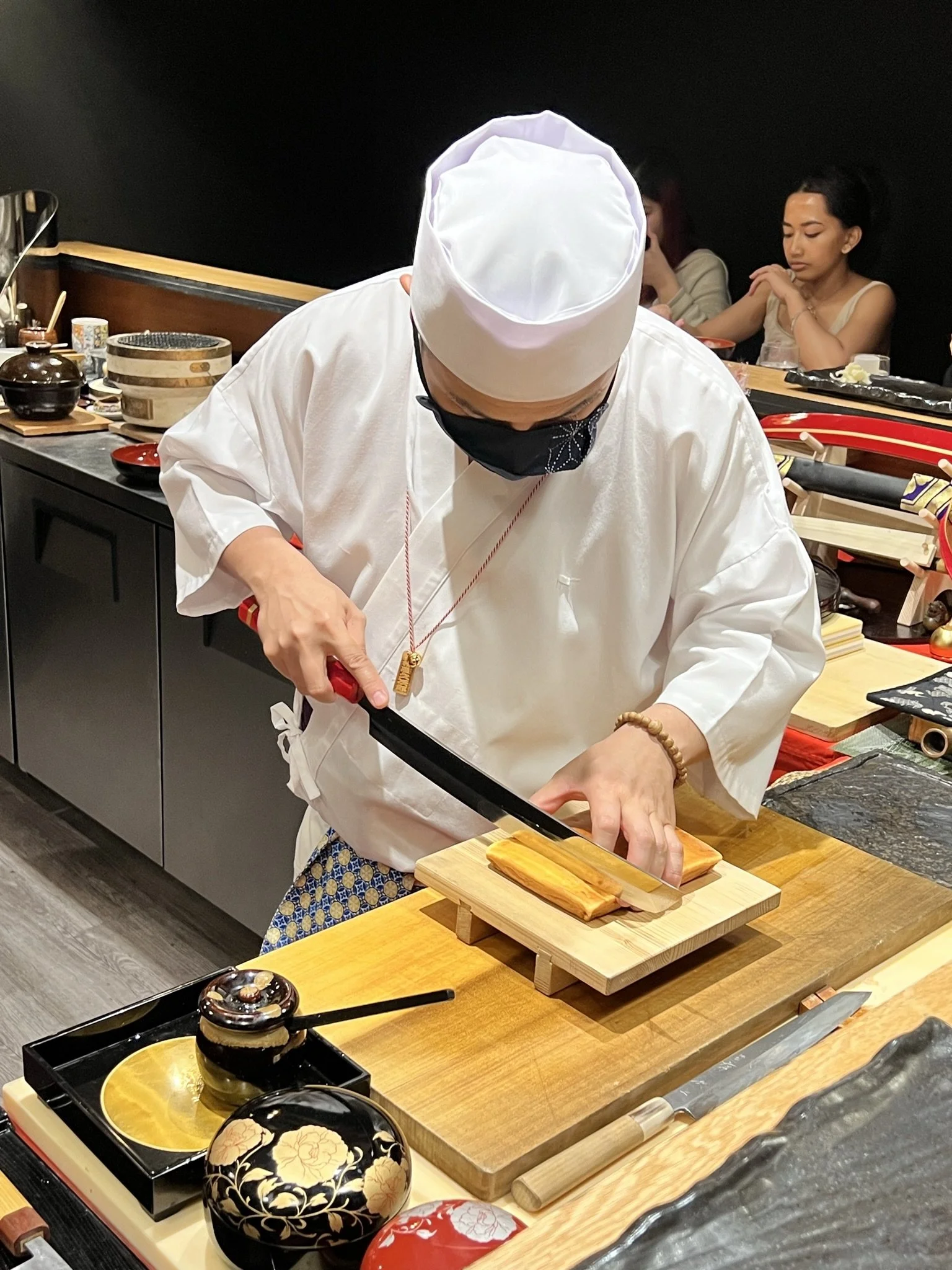 Chef Takuya Matsuda performing a cut at his restaurant, Okeya Kyujiro (Montreal). (2021 - present)