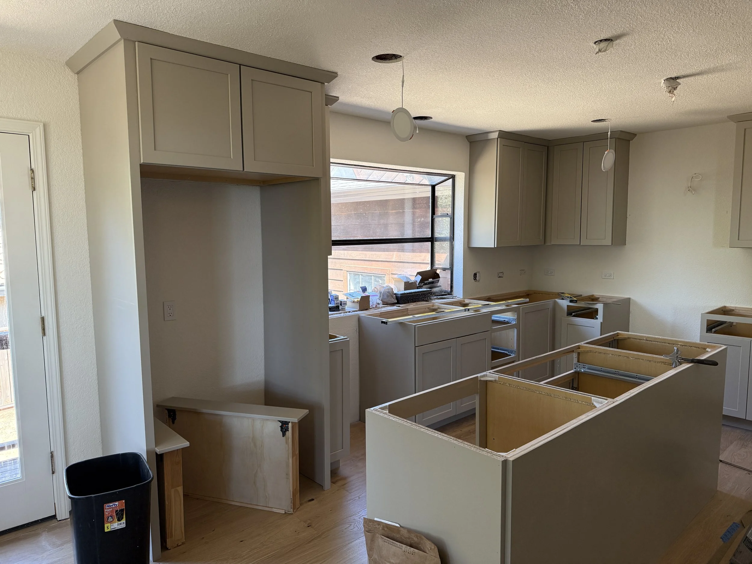 During the install process
Denver Door Style
Painted Oat Color
Shaker Style Island
Kitchen Cabinet Remodel 