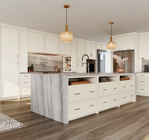 Modern kitchen with white cabinets, a marble island, pendant lighting, and stainless steel appliances.