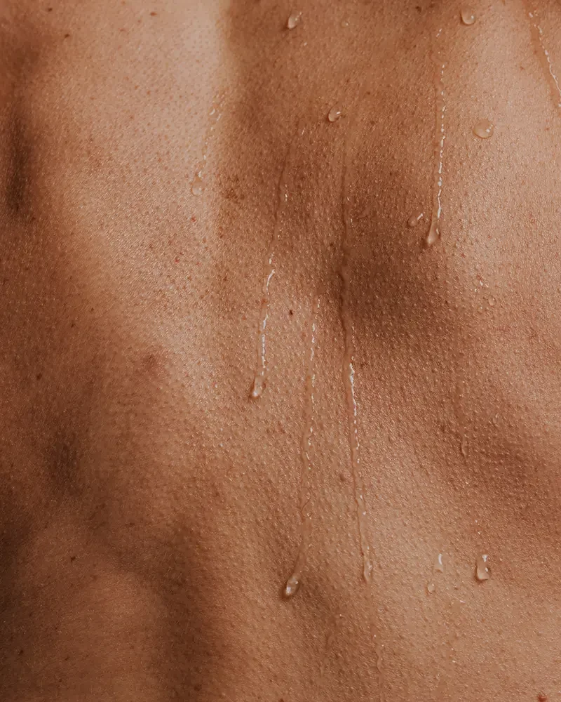 Close-up of wet skin with water droplets