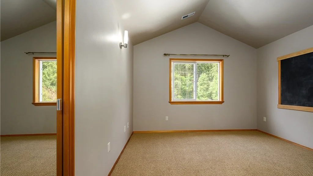 Bedroom with window and carpeting at 5067 E 26th Dr Bellingham WA 98226