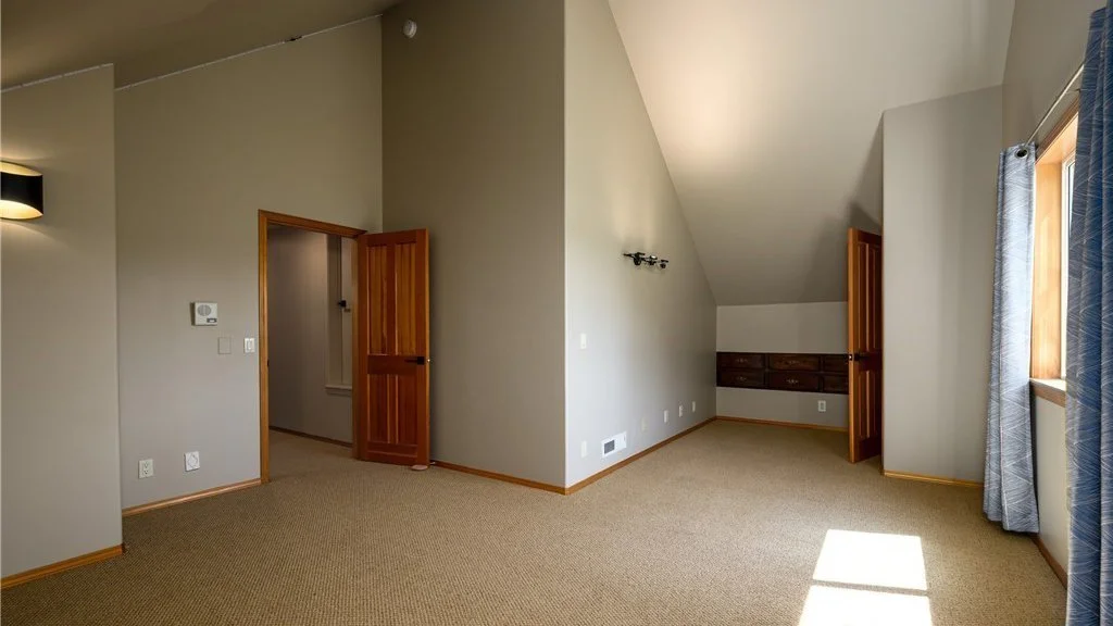 Upstairs bedroom with closet, corner nook and carpeting at 5067 E 26th Dr Bellingham WA 98226