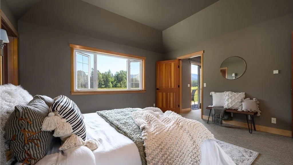 Bedroom with long window and furniture at 5067 E 26th Dr Bellingham WA 98226
