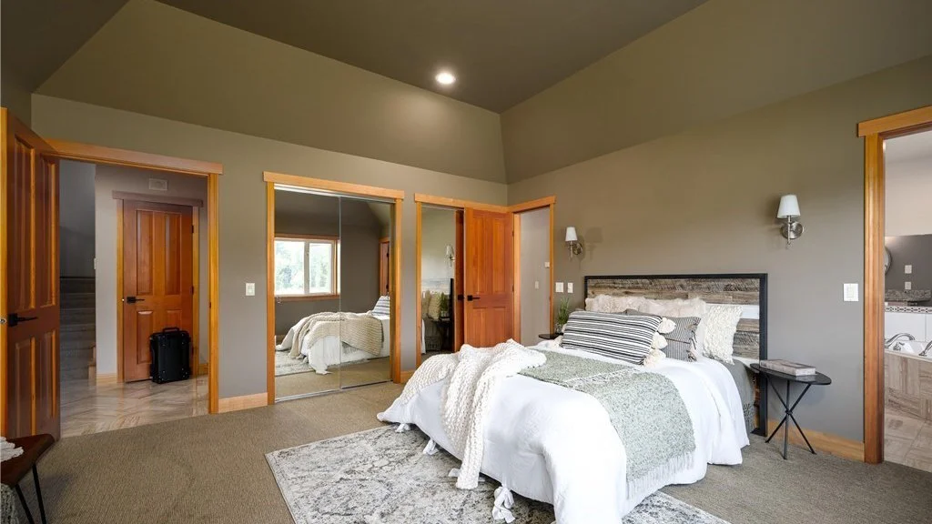 Bedroom with mirrored closet and bed at 5067 E 26th Dr Bellingham WA 98226