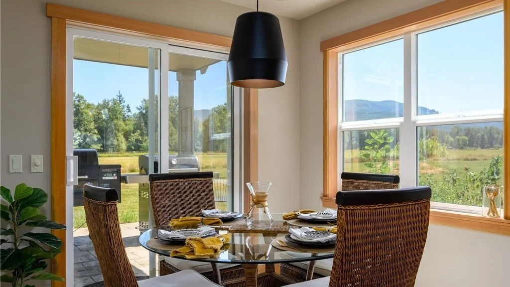 Dining room with views out of window and back sliding door at 5067 E 26th Dr Bellingham WA 98226