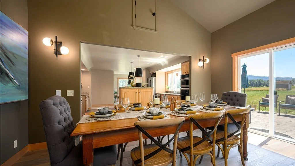 Dining room with table for ten and back sliding door view at 5067 E 26th Dr Bellingham WA 98226