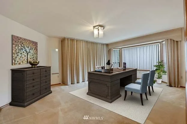 Den with two large windows and low pile carpeting at 1300 28th Avenue Court, Milton, WA 98354
