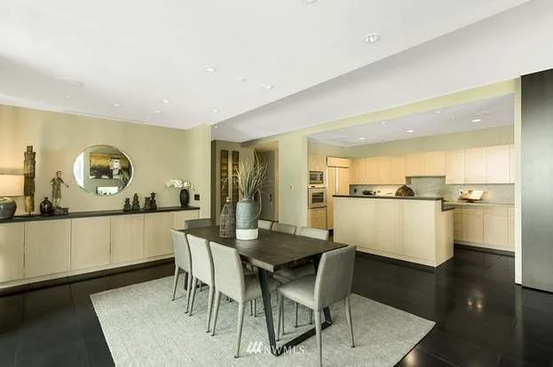 Dining area next to kitchen and bar/work area at 715 2nd Ave #1703 Seattle WA 98104