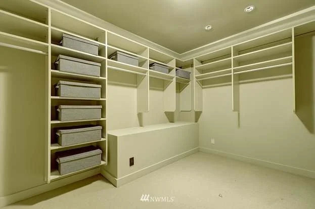 Storage room with built in shelving and closets at 715 2nd Ave #1703 Seattle WA 98104