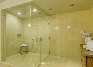 Bathroom roll-in shower with hand held shower head at 715 2nd Ave #1703 Seattle WA 98104