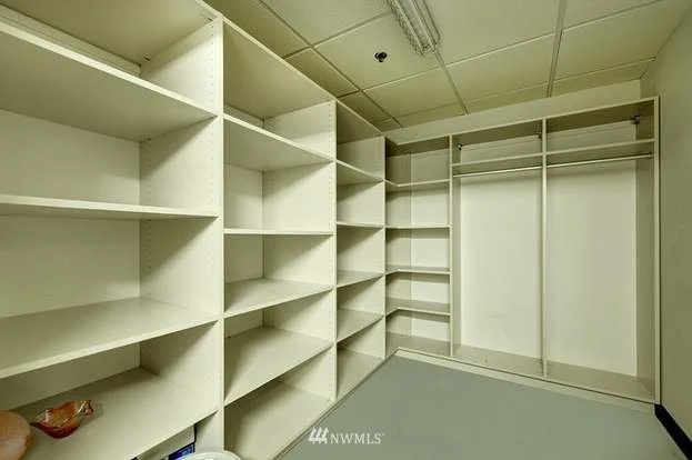 Storage room with built in shelving and closets at 715 2nd Ave #1703 Seattle WA 98104