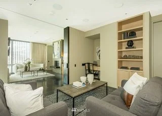 Den area with built in shelving and desk nook at 715 2nd Ave #1703 Seattle WA 98104