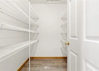 Walk-in pantry with shelving on two sides at 12112 Roosevelt Rd, Snohomish, WA 98290