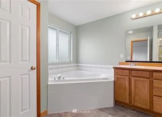 Bathroom with jacuzzi tub at 12112 Roosevelt Rd, Snohomish, WA 98290