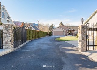 Gated entrance to 104 Quail Lane Cashmere WA 98815