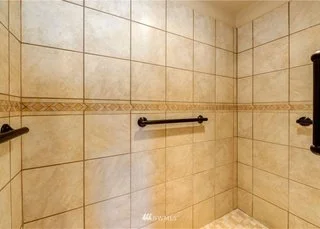 Roll in shower with grab bars on three sides at 104 Quail Lane Cashmere WA 98815