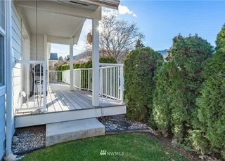 Deck and step down onto lawn and landscaping at 104 Quail Lane Cashmere WA 98815