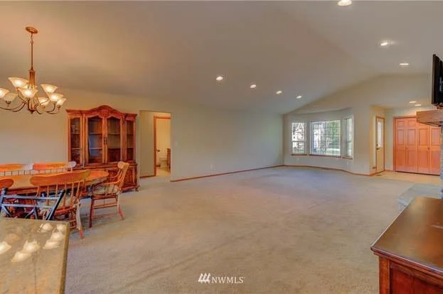 Open concept living room with recessed lighting at 104 Quail Lane Cashmere WA 98815