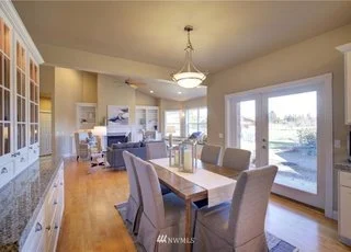 Dining room area with built in china cabinet and storage at 2125 118th Ave E Edgewood WA 98372