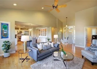 Living room area with ceiling fan and recessed lighting at 2125 188th Ave E Edgewood WA 98372