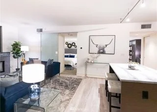 Open floor plan kitchen and living room at 820 Blanchard St #810 Seattle 98121