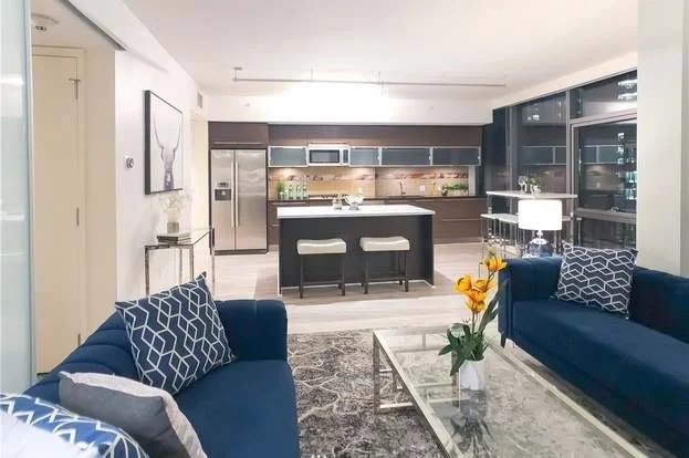 Open floor plan living room and kitchen at 820 Blanchard St #810 Seattle WA 98121