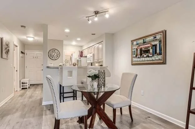 Dining area and hallway leading to front door at 2530 15th Ave W #508 Seattle WA 98119