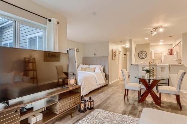 Open floor plan including living, dining and bedroom areas at 2530 15th Ave W #508 Seattle 98119