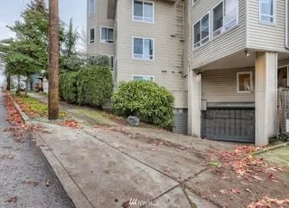 Street view of covered parking entrance at 2530 15th Ave W Seattle WA 98119