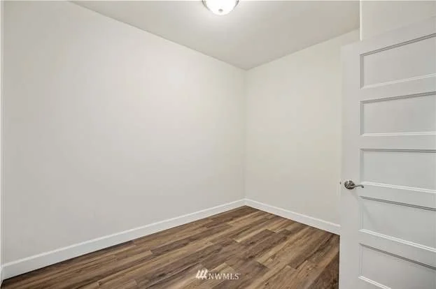 Bedroom with hardwood floors at 112 Skyhawk Dr Toledo WA 98591