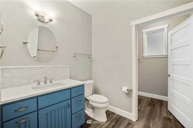 Bathroom sinks, cabinets and toilet at 112 Skyhawk Dr Toledo WA 98591