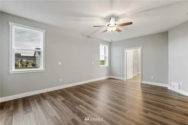 Livingroom with ceiling fan and hardwood floors at 112 Skyhawk Dr Toledo WA 98591