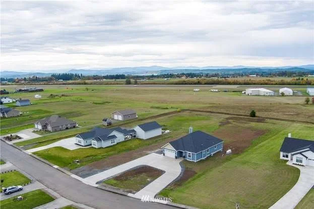 Aerial view of home and surrounding properties at 112 Skyhawk Dr Toledo WA 98591
