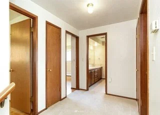 Upstairs hallway leading to bathroom and bedrooms at 21700 Calhoun Road Monroe, WA 98272
