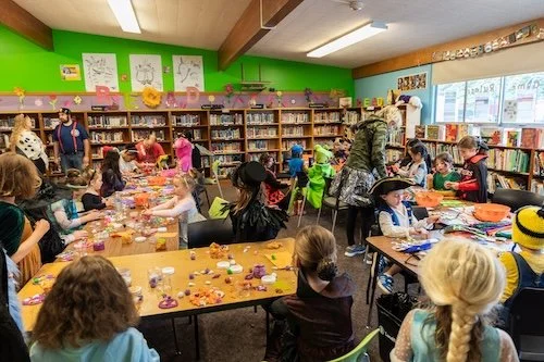 Kids doing crafts in library