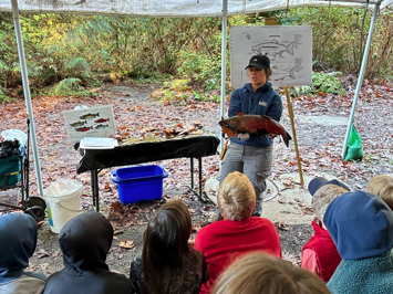 Children listening to biologist at Carkeek Park