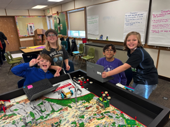 5th graders doing lego robotics