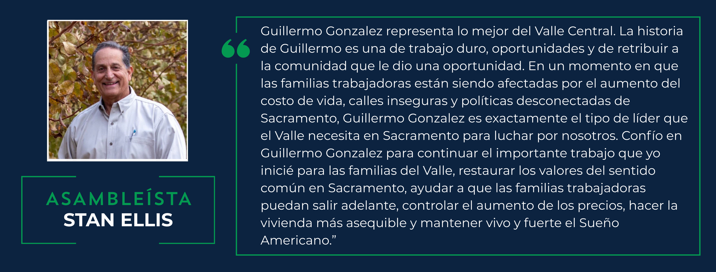 Photograph of Stan Ellis, a man with dark hair wearing a white shirt, standing outdoors in front of trees with leaves.