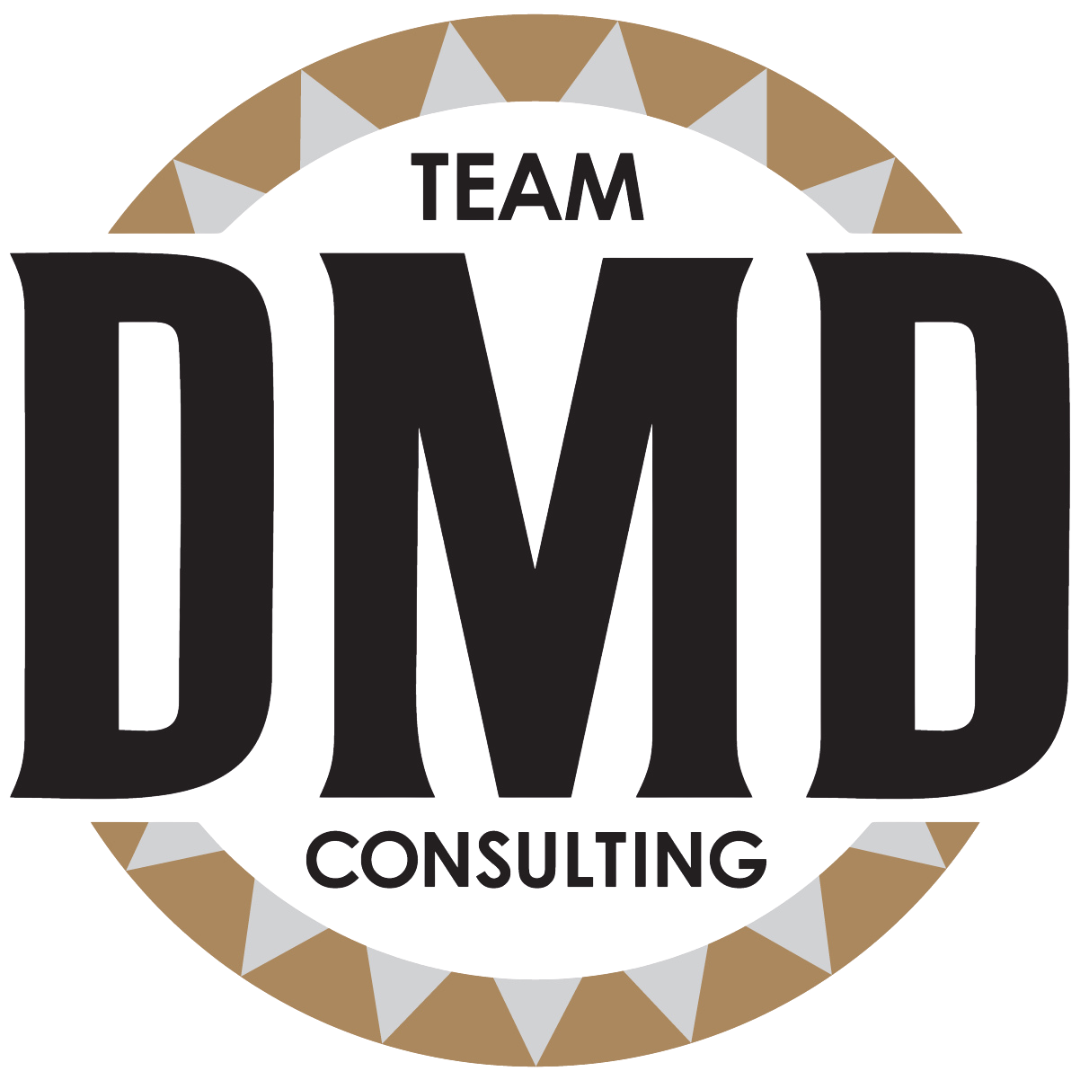 Logo for DMD Consulting with large black letters DMD, a tan semi-circle with white triangles around the edge, and smaller text 'TEAM' above and 'CONSULTING' below.
