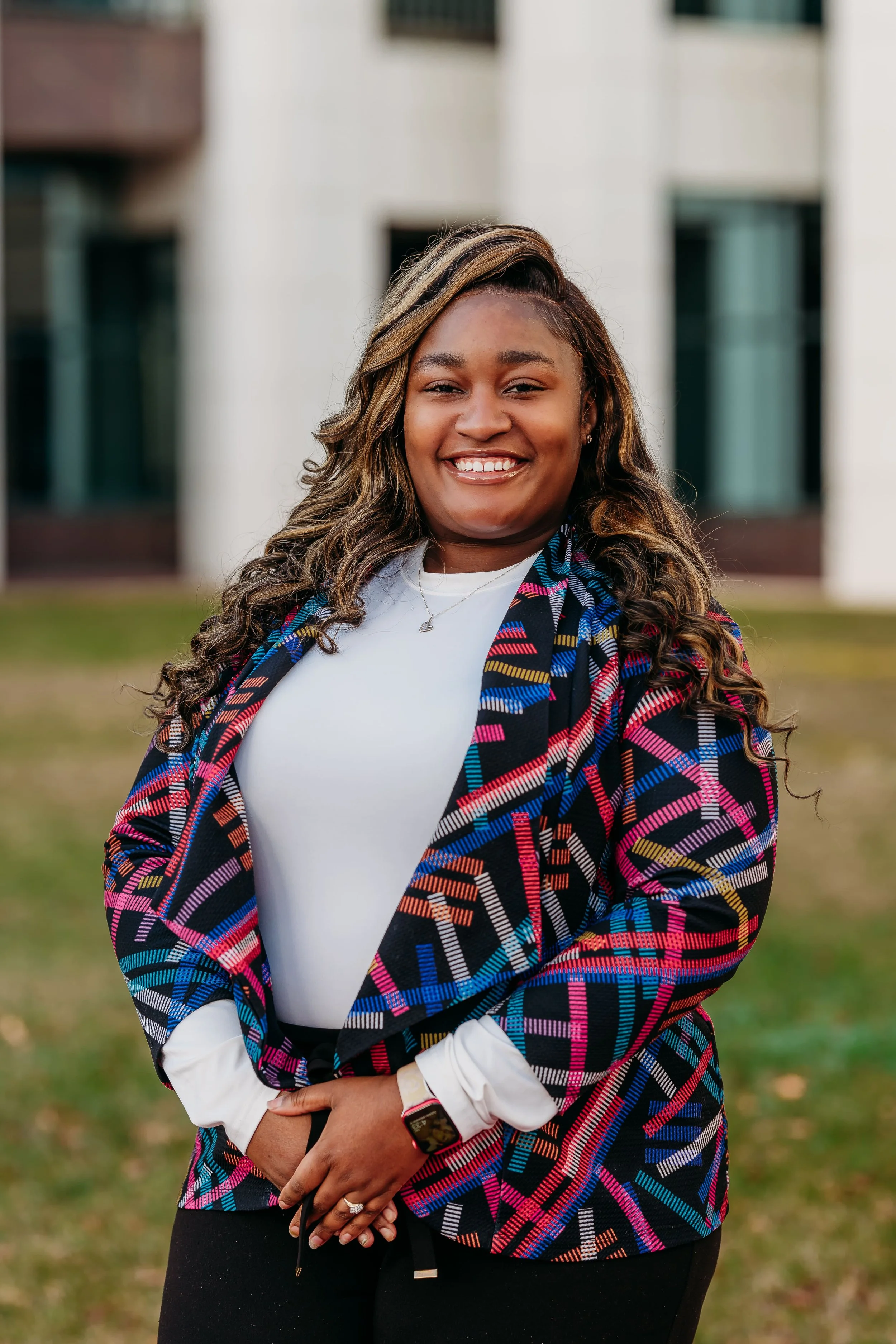 Outdoor professional headshot outside the Leon County Courthouse with natural light in Tallahassee, Florida