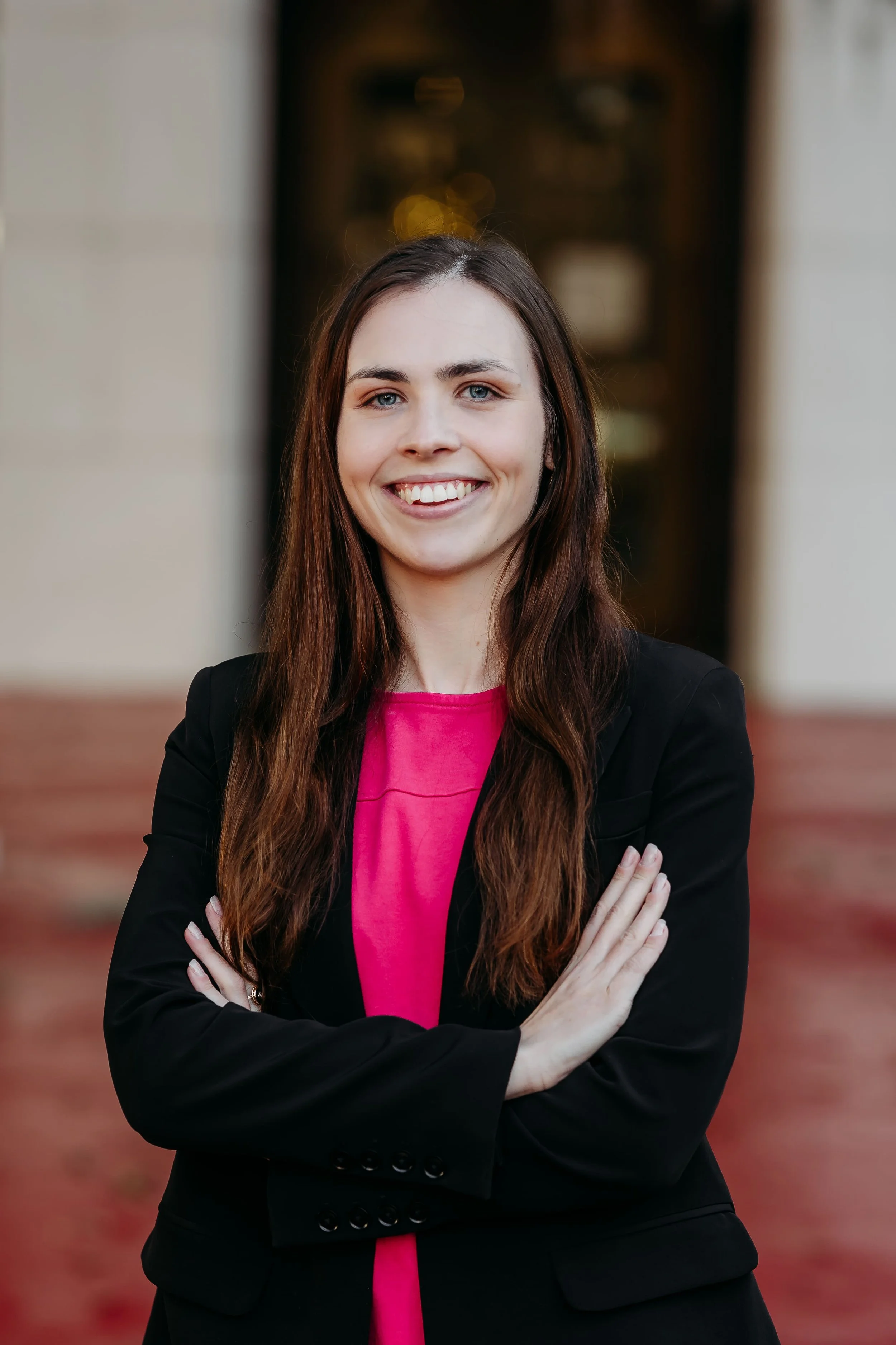 Outdoor professional headshot outside the Leon County Courthouse with natural light in Tallahassee, Florida