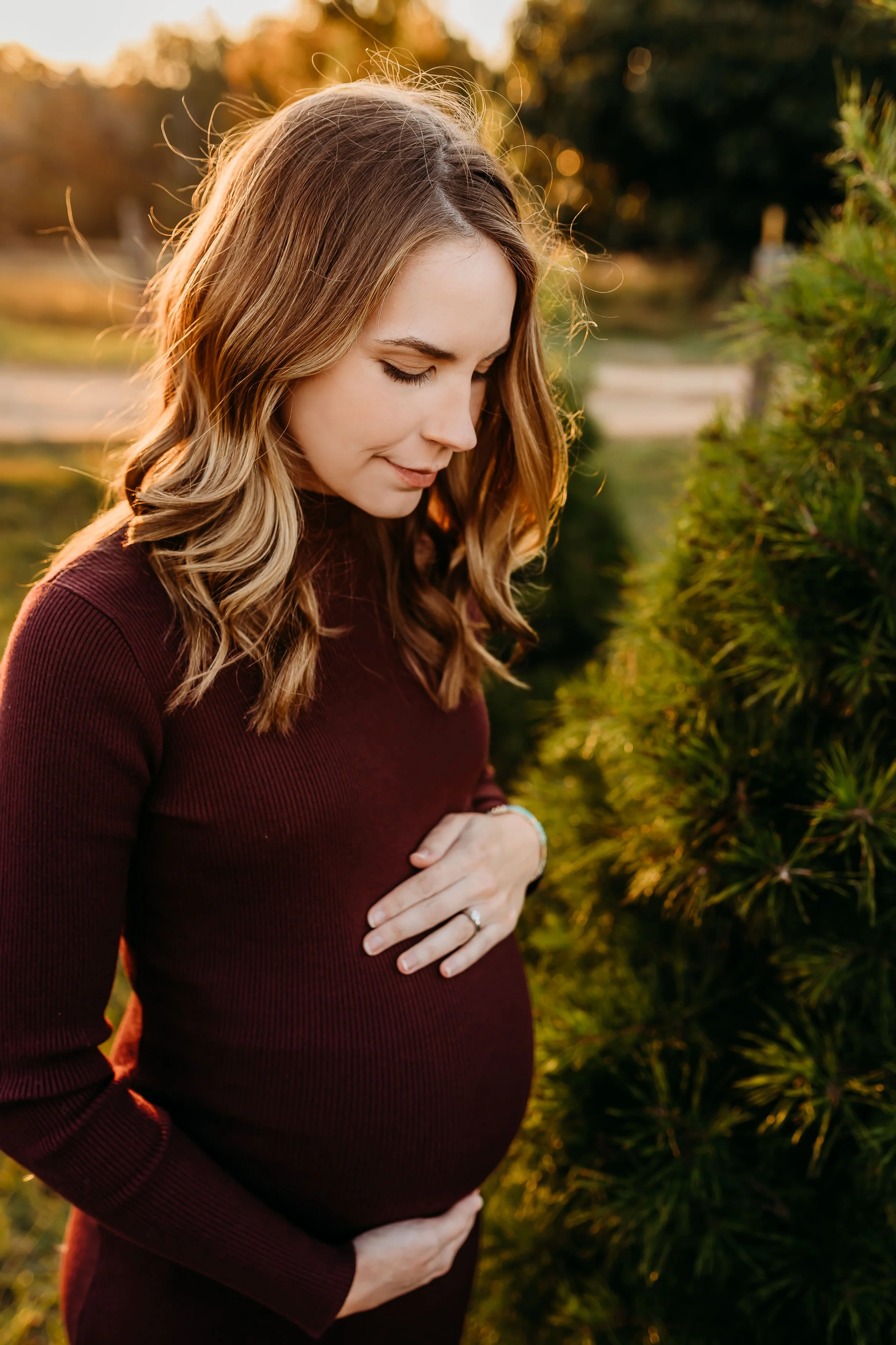 Outdoor natural light sunset maternity photography session at Spring Hill Tree Farm in Bainbridge, Georgia