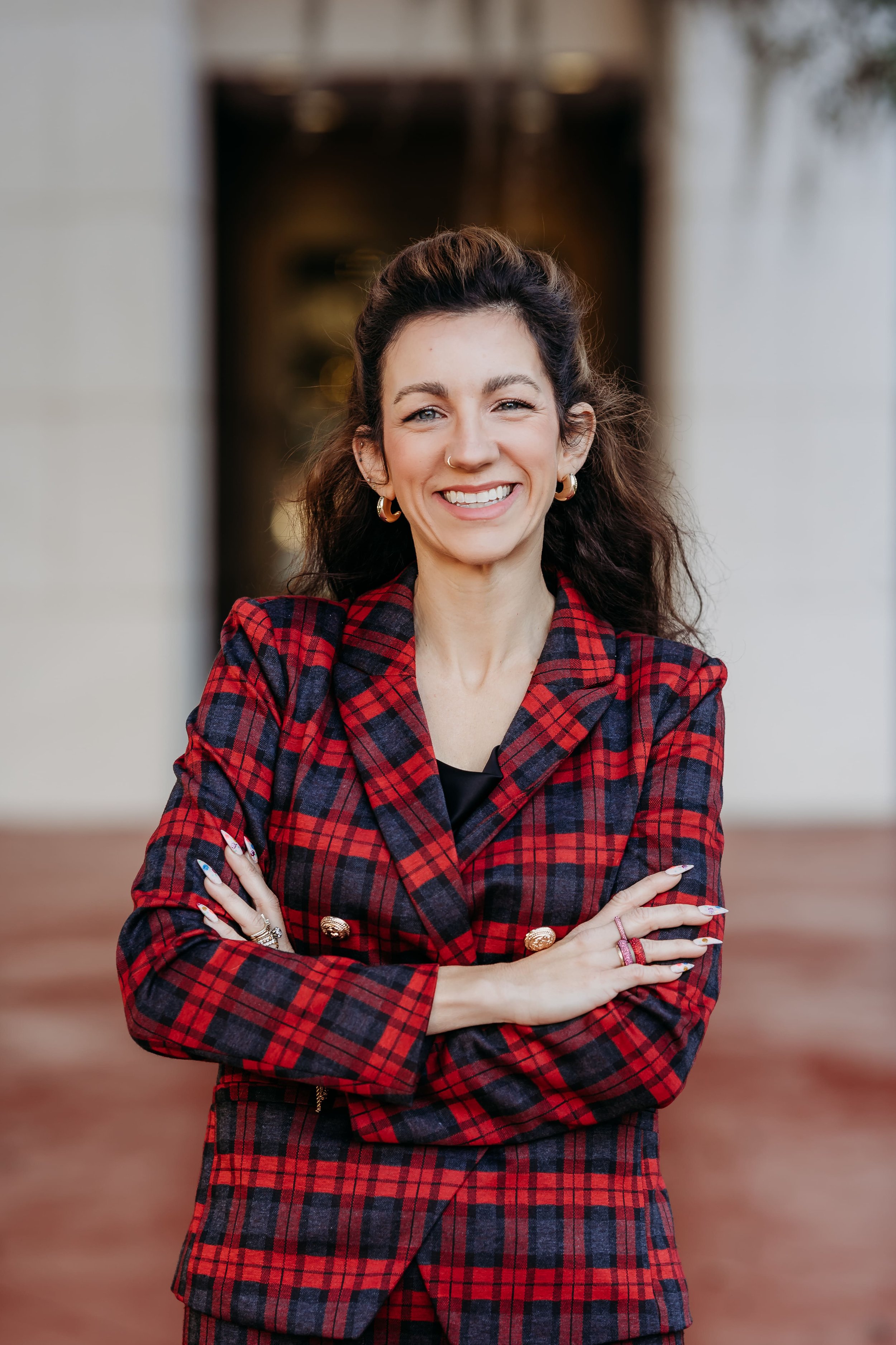 Outdoor professional headshot outside the Leon County Courthouse with natural light in Tallahassee, Florida
