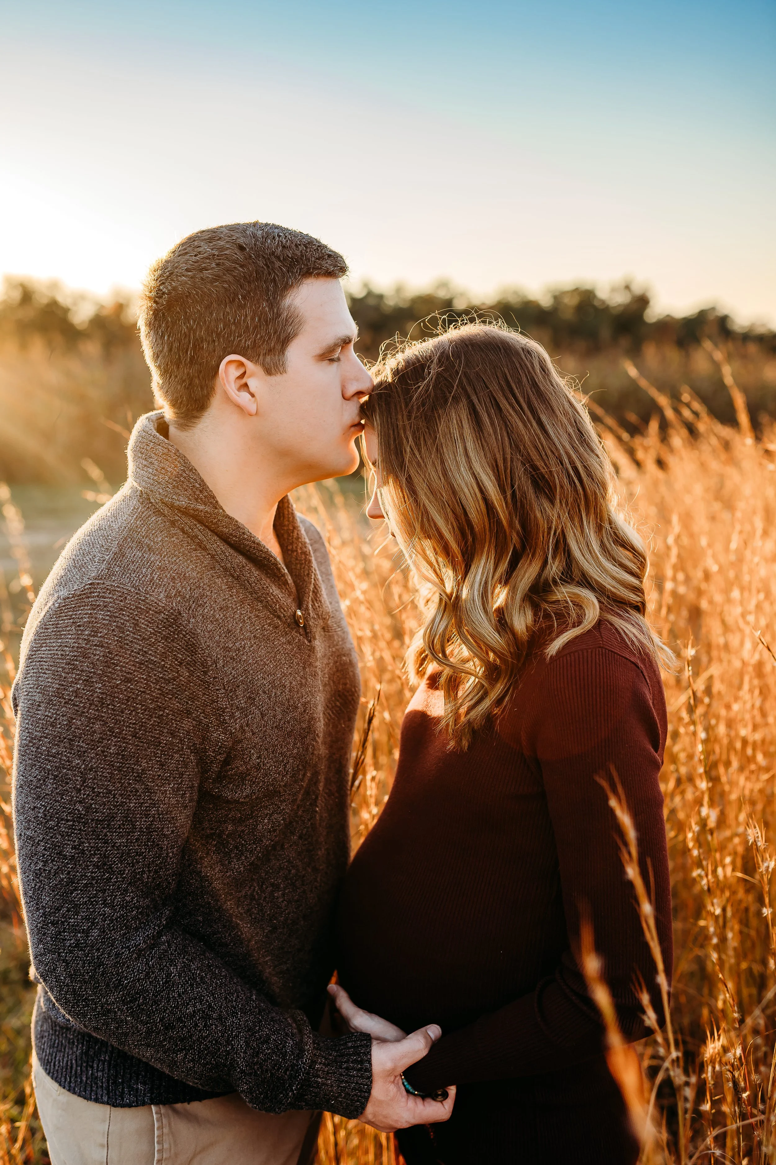 Outdoor natural light sunset maternity photography session at Spring Hill Tree Farm in Bainbridge, Georgia